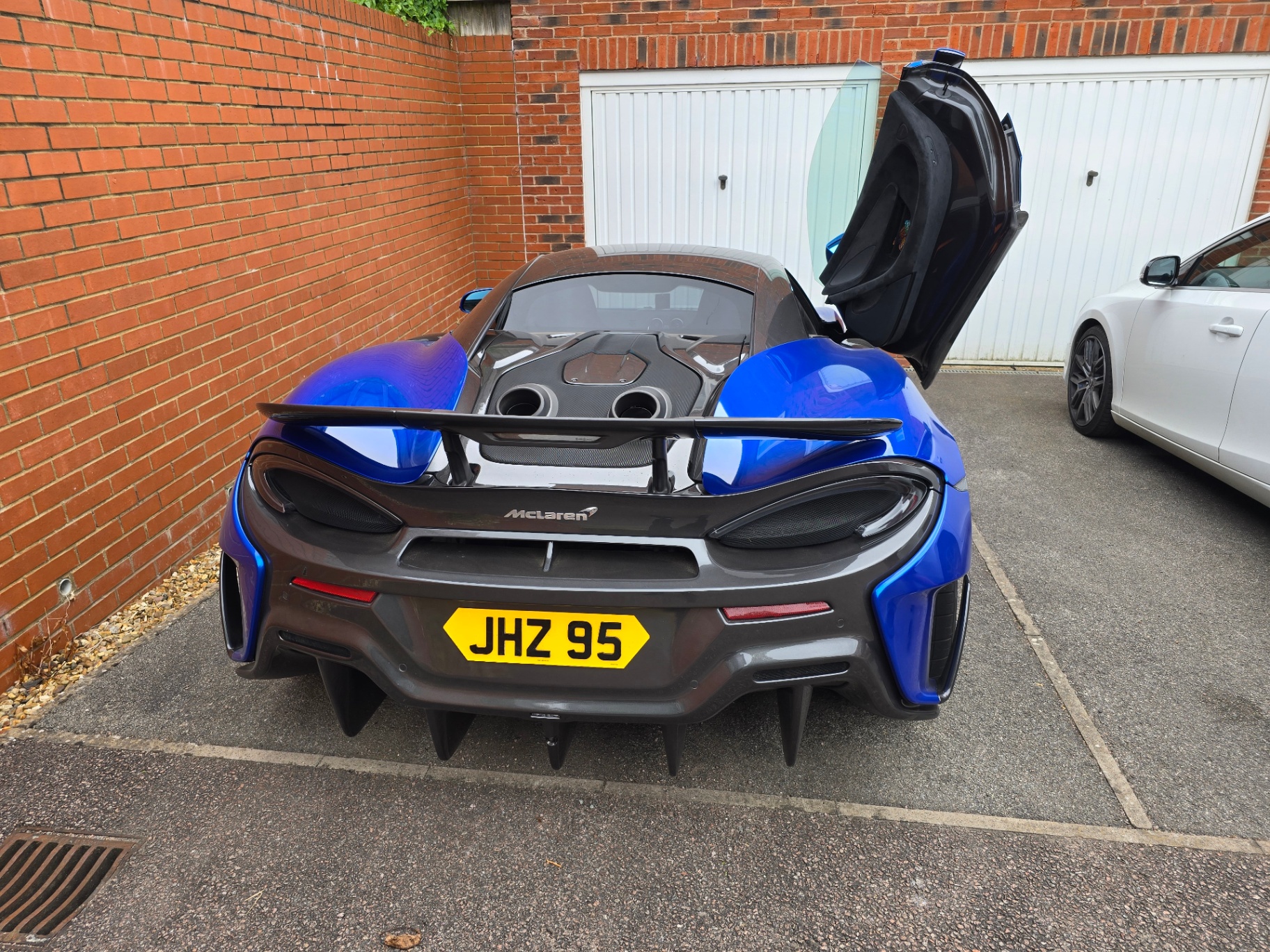 Blue McLaren 600LT rear view